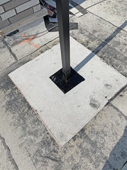 Finished Ultra Aluminum Railing Post On Rooftop Terrace Shows Post Flush With Walking Surface And Sealed Against Water Infiltration Finished Ultra Aluminum Railing Post On Rooftop Terrace Shows Post Flush With Walking Surface And Sealed Against Water Infiltration