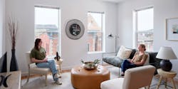 Two women in modern affordable housing unit Two women in modern affordable housing unit