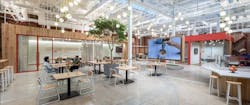 Creating New Avenues For In House Operations, The Office Café Is Bordered By Generous Meeting Rooms, The Café Bar And Tasting Room, And A Sizable Screen That Pilots The Company’s Digital Media Photo By Slam Creating New Avenues For In House Operations, The Office Café Is Bordered By Generous Meeting Rooms, The Café Bar And Tasting Room, And A Sizable Screen That Pilots The Company’s Digital Media Photo By Slam