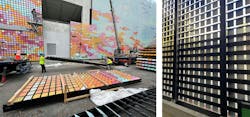 Construction workers building moving tech mural Construction workers building moving tech mural