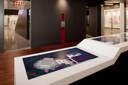 An RFID-chipped book on one of the digital tables An RFID-chipped book on one of the digital tables