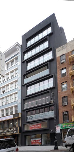 The exterior of 60 Orchard street with a NanaWall system fully opened The exterior of 60 Orchard street with a NanaWall system fully opened