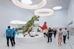A LEGO House room with LEGO dinosaur creations A LEGO House room with LEGO dinosaur creations