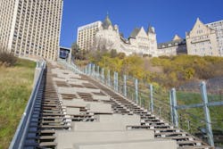 The Kebony wood stairs and concrete seats running parallel to the funicular The Kebony wood stairs and concrete seats running parallel to the funicular
