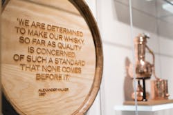 Whiskey barrel with an Alexander Walker quote on it Whiskey barrel with an Alexander Walker quote on it
