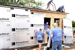 Atlas insulation being installed Atlas insulation being installed