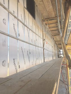 Atlas insulation being installed Atlas insulation being installed