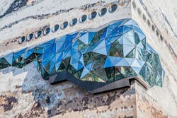 Close up of glass facade and stone Close up of glass facade and stone