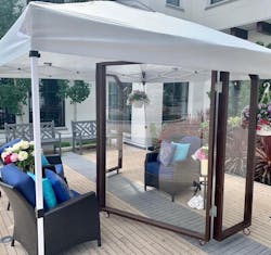 Outdoor Living Room has room for two seniors to safely visit with family members during coronavirus pandemic Outdoor Living Room has room for two seniors to safely visit with family members during coronavirus pandemic