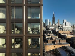 large window openings offer framed views of the surrounding cityscape large window openings offer framed views of the surrounding cityscape