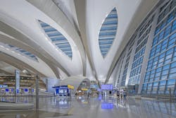 View of the Departures Hall with skylights at Zayed International Airport, Terminal A. Photo: Victor Romero, courtesy Kohn Pedersen Fox (KPF) View of the Departures Hall with skylights at Zayed International Airport, Terminal A. Photo: Victor Romero, courtesy Kohn Pedersen Fox (KPF)