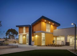 Puesta del Sol Apartments, San Diego exterior at night of affordable housing project Puesta del Sol Apartments, San Diego exterior at night of affordable housing project