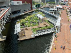 Baltimore’s National Aquarium opens 10,000-sf floating wetland that mimics the harbor’s original tidal marsh habitat. Photo: Philip Smith, National Aquarium Baltimore’s National Aquarium opens 10,000-sf floating wetland that mimics the harbor’s original tidal marsh habitat. Photo: Philip Smith, National Aquarium
