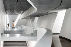 Second-level interior view overlooking the grand stair and landing gallery. Photo: ©Mauricio Rojas, Courtesy of UT Dallas Second-level interior view overlooking the grand stair and landing gallery. Photo: ©Mauricio Rojas, Courtesy of UT Dallas