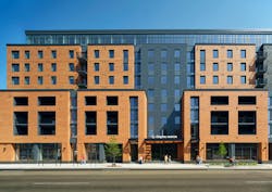 Chapter Madison Exterior: At Chapter Madison, an LJC-designed student housing complex at 832 Regent St. near the University of Wisconsin-Madison, dark metal cladding breaks up masonry massing to create a visual effect evocative of the area’s historic rowhomes Chapter Madison Exterior: At Chapter Madison, an LJC-designed student housing complex at 832 Regent St. near the University of Wisconsin-Madison, dark metal cladding breaks up masonry massing to create a visual effect evocative of the area’s historic rowhomes