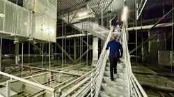 Workers climbing stairs. FOS photo