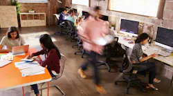 Elevated View Of Workers In Busy Modern Design Office