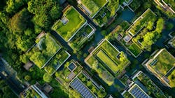 An aerial view captures a lush, green residential neighborhood with solar panels An aerial view captures a lush, green residential neighborhood with solar panels