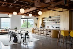 MGP Ingredients Offices, Leawood, Kan. The lobby leads to the 10,000-sf office’s highlight, a hospitality area anchored by a bar that features MGP Ingredients’ liquor brands. This flexible area is used day-to-day for employee meals and as a space for special client events and gatherings MGP Ingredients Offices, Leawood, Kan. The lobby leads to the 10,000-sf office’s highlight, a hospitality area anchored by a bar that features MGP Ingredients’ liquor brands. This flexible area is used day-to-day for employee meals and as a space for special client events and gatherings