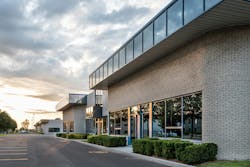 Small business building exterior. The exterior facade of a generic small business Small business building exterior. The exterior facade of a generic small business