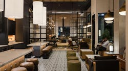 Pictured: The Midland Lofts, Kansas City, Mo. To supplement the apartments’ compact floorplans, Midland Lofts offers community amenities such as a library, co-working space, and coffee bar Pictured: The Midland Lofts, Kansas City, Mo. To supplement the apartments’ compact floorplans, Midland Lofts offers community amenities such as a library, co-working space, and coffee bar