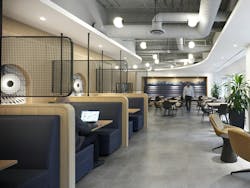 Hub International, Toronto, Ontario, Canada. The work café extends around the corner, where cozy booths and lounge seating provide a different setting for work and social interactions at HUB Hub International, Toronto, Ontario, Canada. The work café extends around the corner, where cozy booths and lounge seating provide a different setting for work and social interactions at HUB