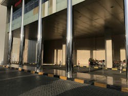 Concrete filled stainless steel finished tubular columns in an entrance of an Big shopping mall construction exterior finishes for an lucrative finishes Concrete filled stainless steel finished tubular columns in an entrance of an Big shopping mall construction exterior finishes for an lucrative finishes