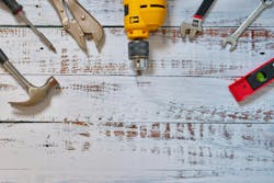 Faltlay ,Construction concept set of tools supplies for home construction builder or repair tools top view on wooden white background Faltlay ,Construction concept set of tools supplies for home construction builder or repair tools top view on wooden white background