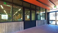 This 1-hour fire-rated assembly with 10-ft tall doors by SAFTI FIRST® allows natural daylight from the outdoor workshop to flow into the indoor workshop. This 1-hour fire-rated assembly with 10-ft tall doors by SAFTI FIRST® allows natural daylight from the outdoor workshop to flow into the indoor workshop.