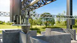 3d printing single-family house with concrete. New technology house building using a modern CNC machine