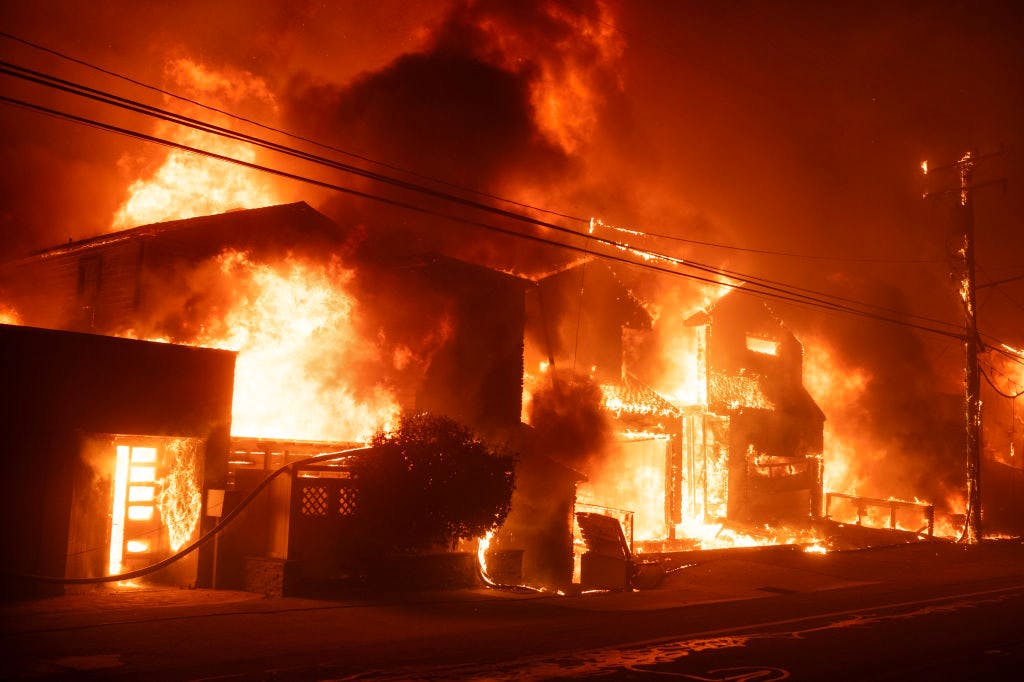 Firefighters battle winds and flames as multiple beachfront homes go up in flames along Pacific Coast Highway in Malibu in the Palisades Fire on Tuesday, January 7, 2025 (Photo by David Crane/MediaNews Group/Los Angeles Daily News via Getty Images).