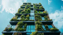 Innovative sustainable building adorned with lush greenery under a vibrant sky