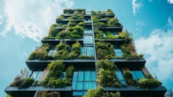 Innovative sustainable building adorned with lush greenery under a vibrant sky Innovative sustainable building adorned with lush greenery under a vibrant sky