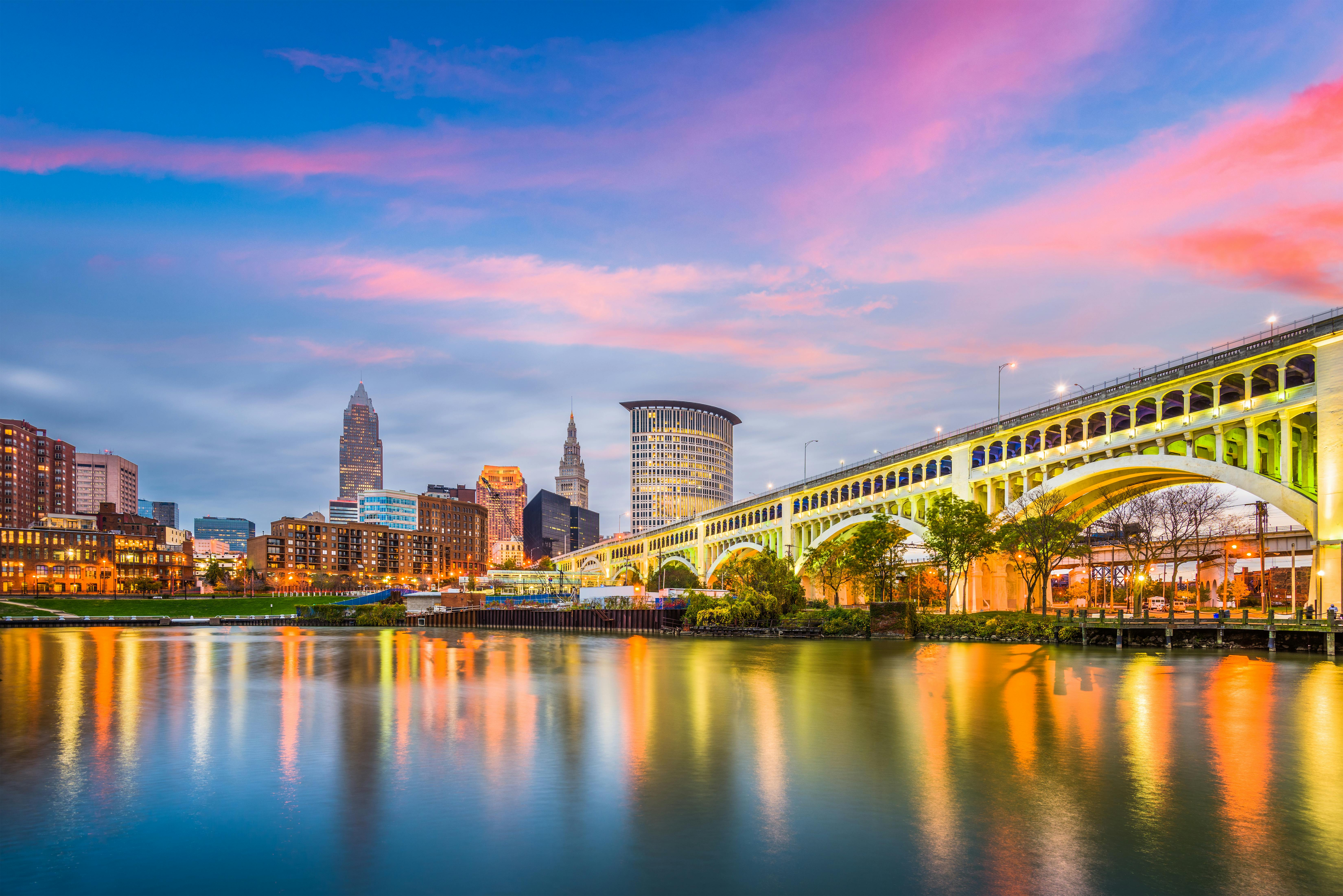 Cleveland, Ohio, USA downtown city skyline on the Cuyahoga River at twilight.