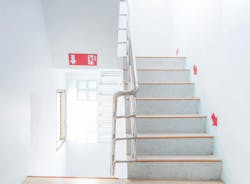 Stairwell fire escape in a modern building. Stairwell fire escape in a modern building.