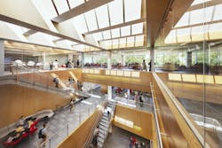 This central hub features flexible seating and open sightlines to the surrounding floors, fostering interaction and connectivity among students, faculty and staff. Photo courtesy CannonDesign This central hub features flexible seating and open sightlines to the surrounding floors, fostering interaction and connectivity among students, faculty and staff. Photo courtesy CannonDesign
