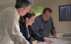 President and Owner Bill O’Keeffe going over project details with VP of Engineering Sharon Heagney and VP of Sales Tim Nass. President and Owner Bill O’Keeffe going over project details with VP of Engineering Sharon Heagney and VP of Sales Tim Nass.