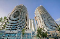 Luxury inviting view of Toronto down town area residential condo stylish, modern buildings. Toronto, Ontario, Canada, June 16, 2017 beautiful luxury inviting view of Toronto down town area residential condo stylish buildings and tower on the side Luxury inviting view of Toronto down town area residential condo stylish, modern buildings. Toronto, Ontario, Canada, June 16, 2017 beautiful luxury inviting view of Toronto down town area residential condo stylish buildings and tower on the side