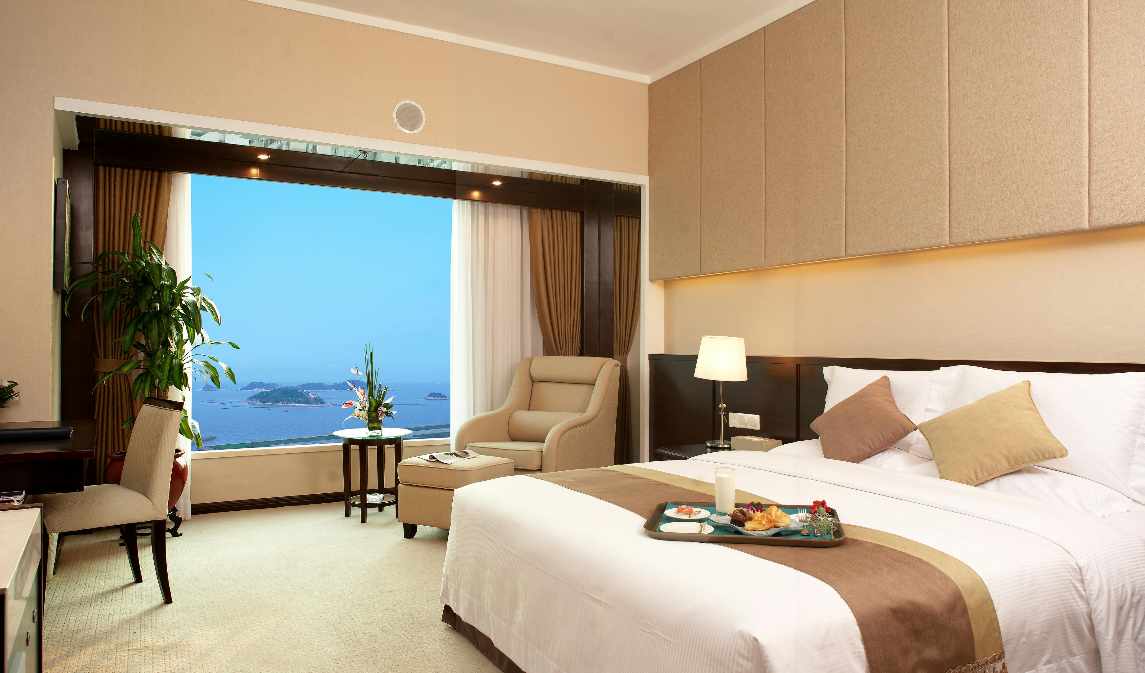 Hotel bed room. A seaview of a modern bed room in a hotel in China