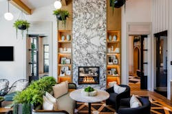 Flooded with natural light and accented by greenery, bold furnishings and distinctive patterned flooring, the lounge at Park & Arbor offers a vibrant, welcoming space that reflects the community’s refined design Flooded with natural light and accented by greenery, bold furnishings and distinctive patterned flooring, the lounge at Park & Arbor offers a vibrant, welcoming space that reflects the community’s refined design