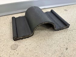 Sample of rubber gland of clamped reinforced rubber EJS. Clamping system not shown Sample of rubber gland of clamped reinforced rubber EJS. Clamping system not shown