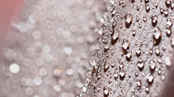 Waterproof textile fabric with rain drops. Waterproof and breathable textile fabric with rain drops on it Waterproof textile fabric with rain drops. Waterproof and breathable textile fabric with rain drops on it