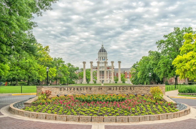 Entrance to the University of Missouri. COLUMBIA, MO/USA - JUNE 9 , 2018: University of Missouri campus entrance and gardens.