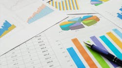 Top view of the pen on finance documents. Top view of the pen on finance documents.
