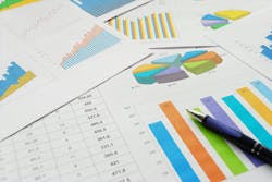 Top view of the pen on finance documents. Top view of the pen on finance documents.