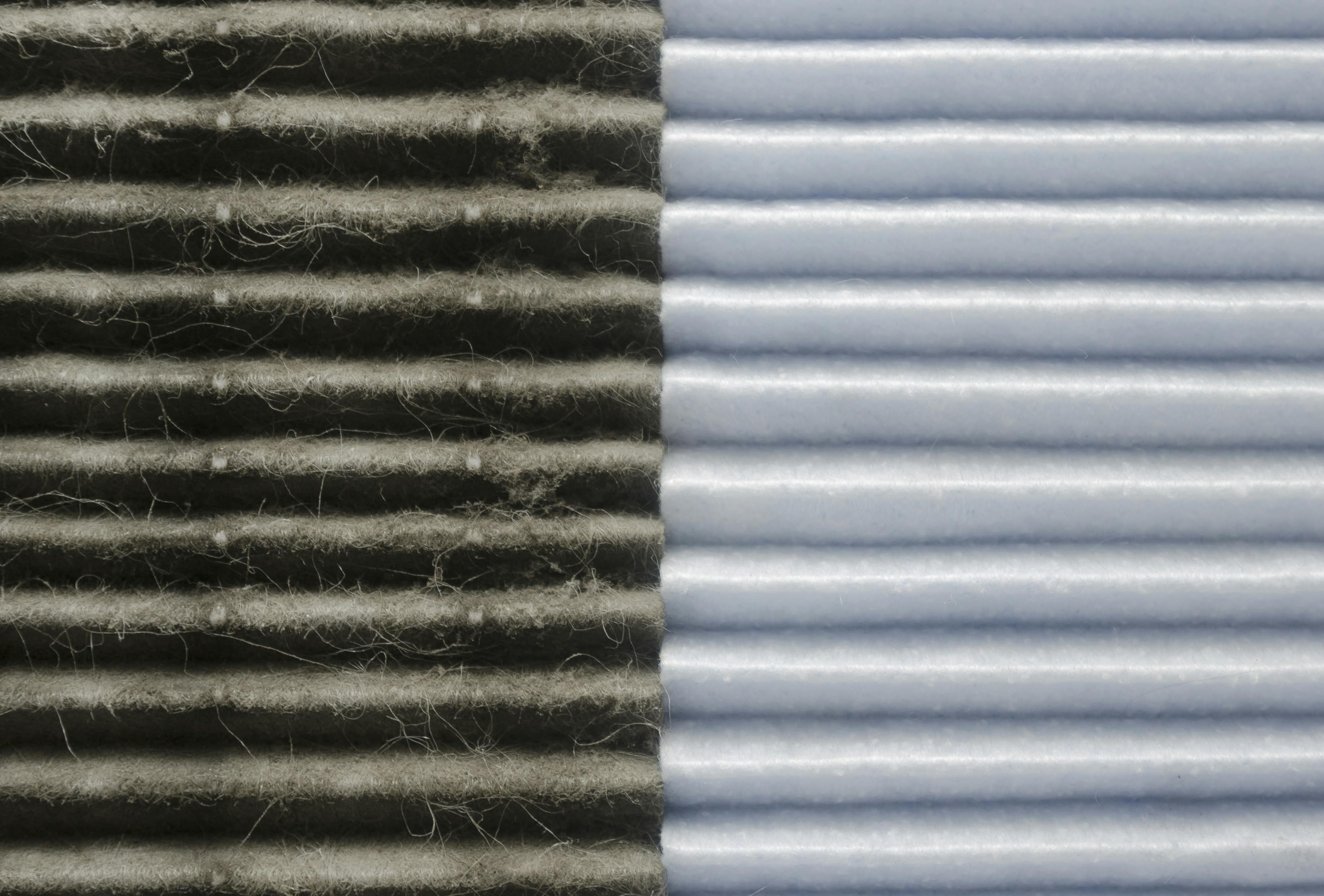 Indoor air quality, two filters comparision. Symmetrical comparison of two air filters, clean and dirty. Air purifier effect on left presenting pollution of air in Cracow city.