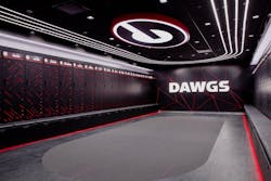 The track and field locker room at the University of Georgia was converted from a football locker room and outfitted with technology and the team’s red and black colors The track and field locker room at the University of Georgia was converted from a football locker room and outfitted with technology and the team’s red and black colors