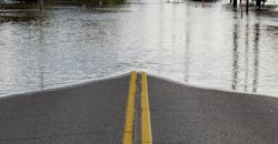 Road Closure From Flooding. Road closed due to river flooding in neighborhood. Road Closure From Flooding. Road closed due to river flooding in neighborhood.