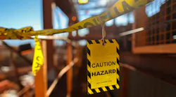Yellow caution sign/ symbols tag applying on the entry construction workplace to ensure safety warning precaution in place from public access construction site