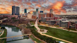 Ariel view of downtown Fort Worth, Texas taken at sunset with Trinity River in the foreground